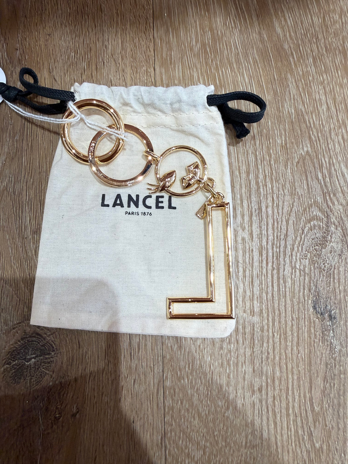 Porte-clés dore lancel 02/06