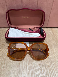 Lunettes Gucci marron et orange TU