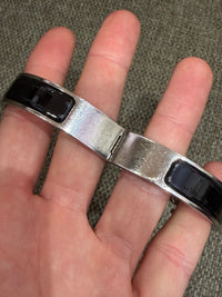 Bracelet noir Clic Hermès, finition argentée 19/10