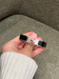 Bracelet noir Clic Hermès, finition argentée 19/10