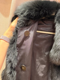 Manteau noir en fourrure T.38 à 42 renard 31/07