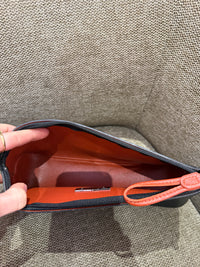 Pochette noir orange Longchamp cuir