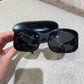 Lunettes de soleil Prada