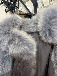 Manteau en vraie fourrure T.36/38 29/09