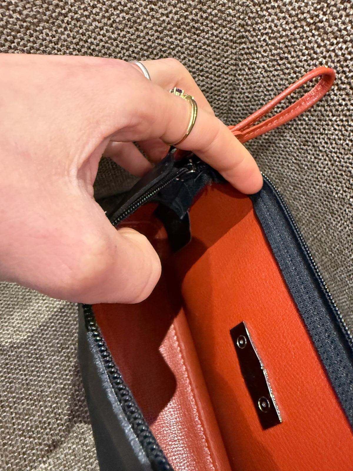 Pochette noir orange Longchamp cuir