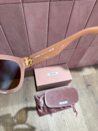 Lunettes de soleil miumiu
