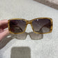 Lunettes de soleil Miu Miu