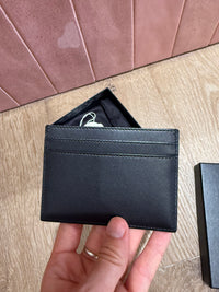 Yves Saint Laurent noir cuir 30/06