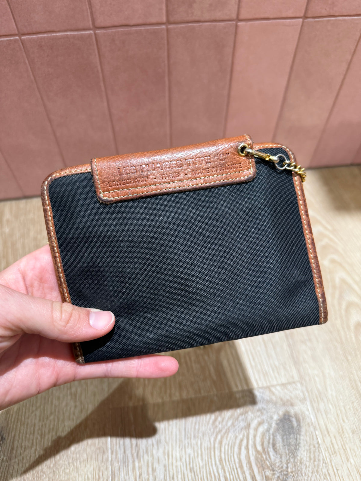 Pochette noire et marron Longchamp (petite)