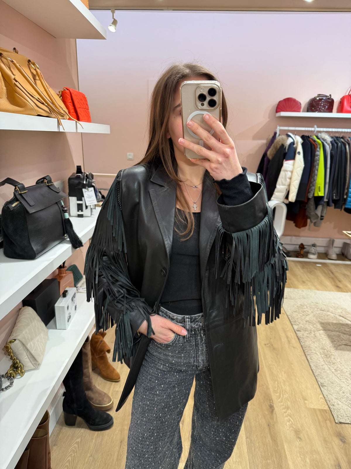 Veste noire en cuir à franges T.38