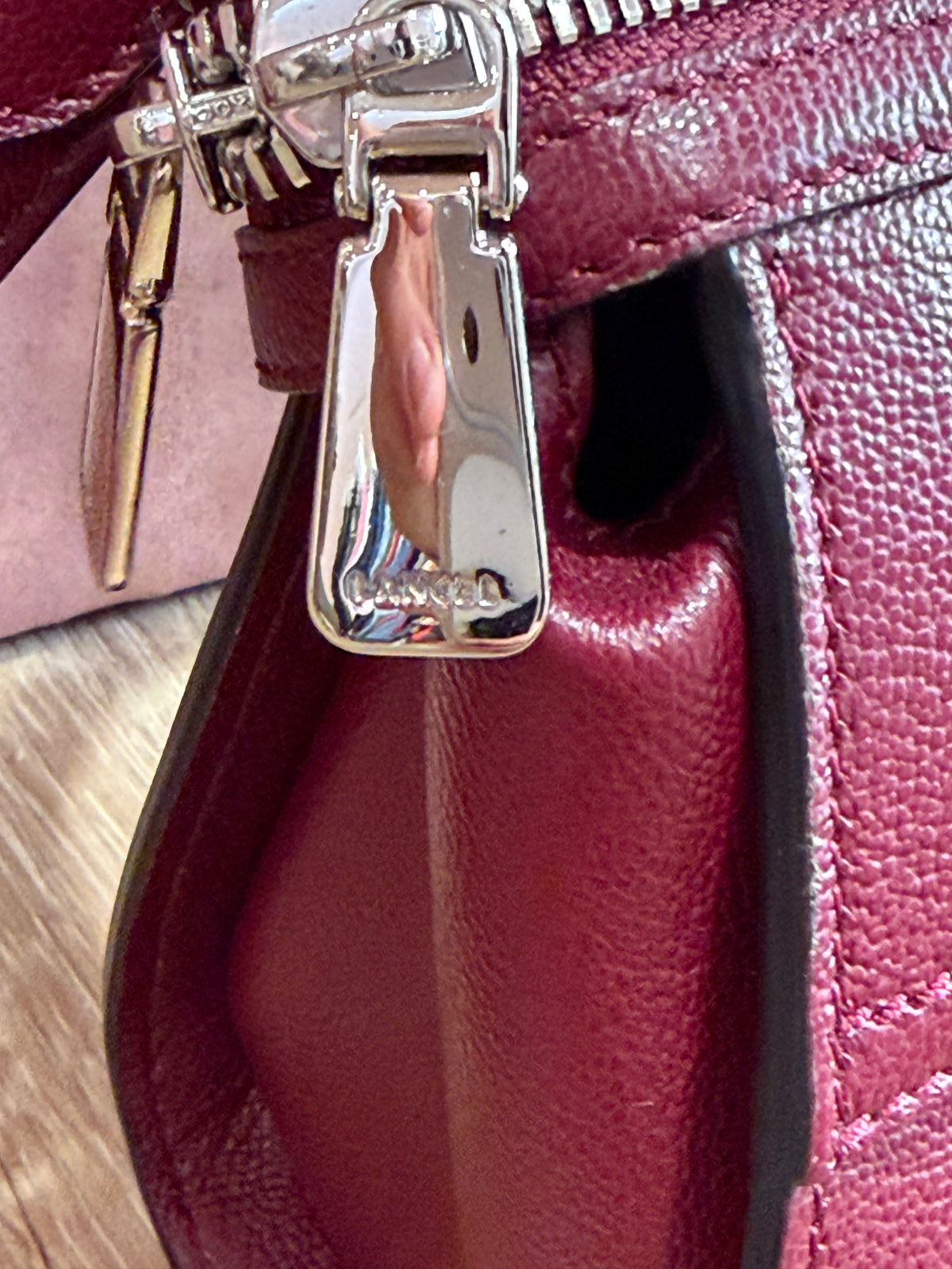 Petit sac bordeaux en cuir lancel 27/08