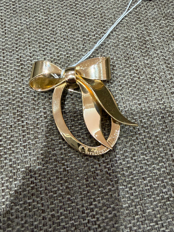 Broche doré Dior 18/09