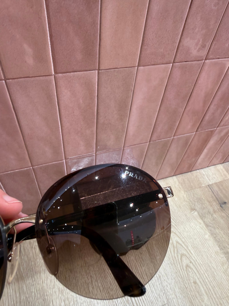 Lunettes rondes Prada TU