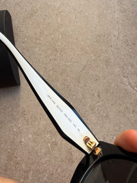 Lunettes Prada blanches neuves 24/07