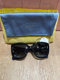 Lunettes Gucci noir et bleu logo