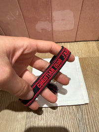 Bracelet rouge Dior 01/06