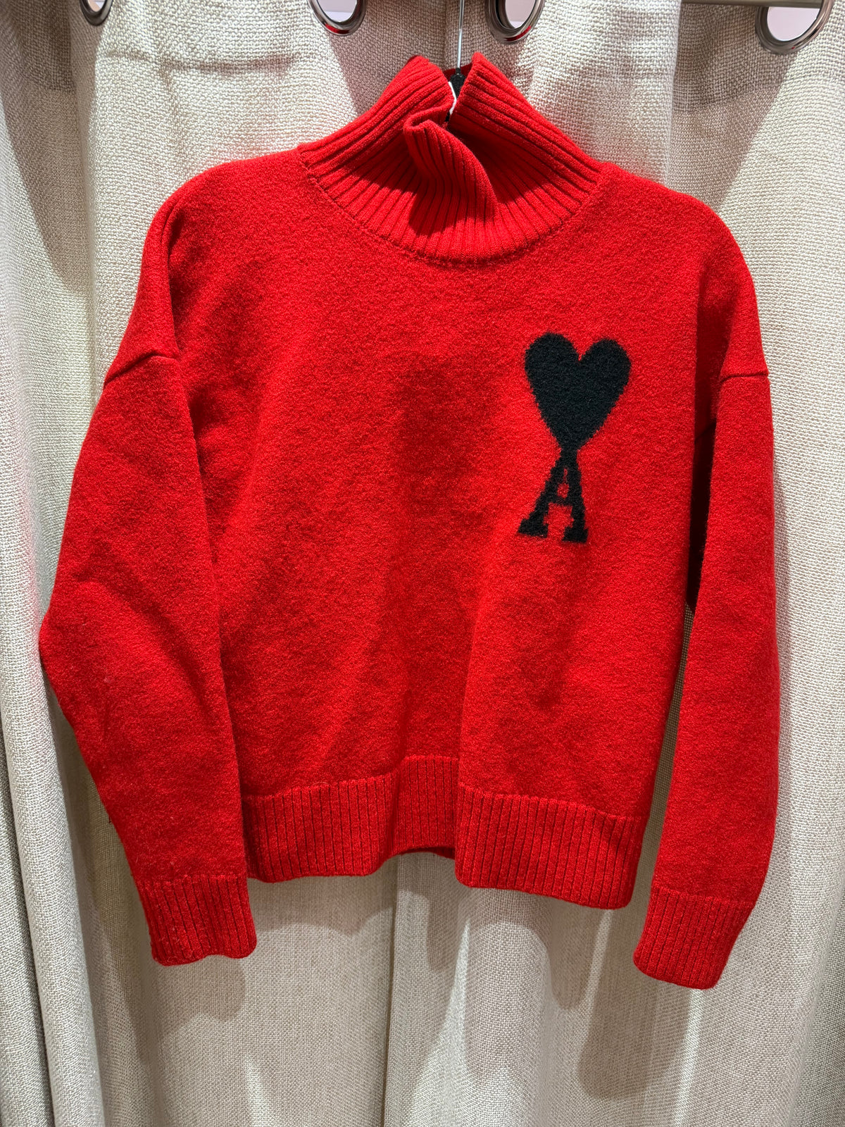 Pull rouge AMI - T.S 04/10