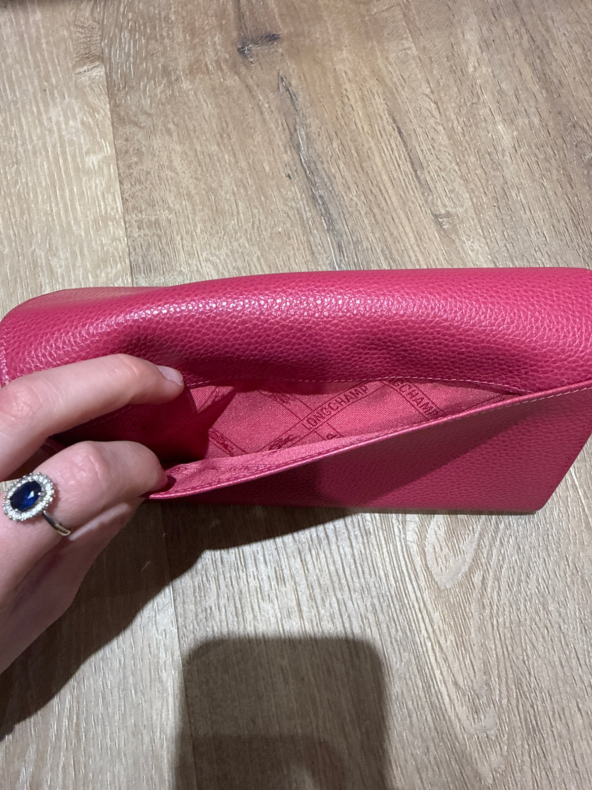 Portefeuille rose en cuir Longchamp