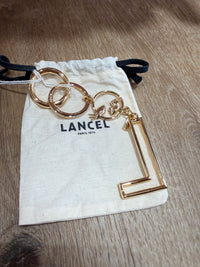 Porte-clés dore lancel 02/06