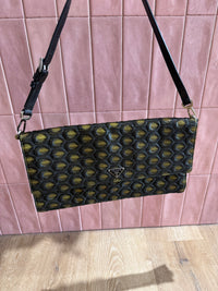 Pochette noire et dorée Prada 24/06