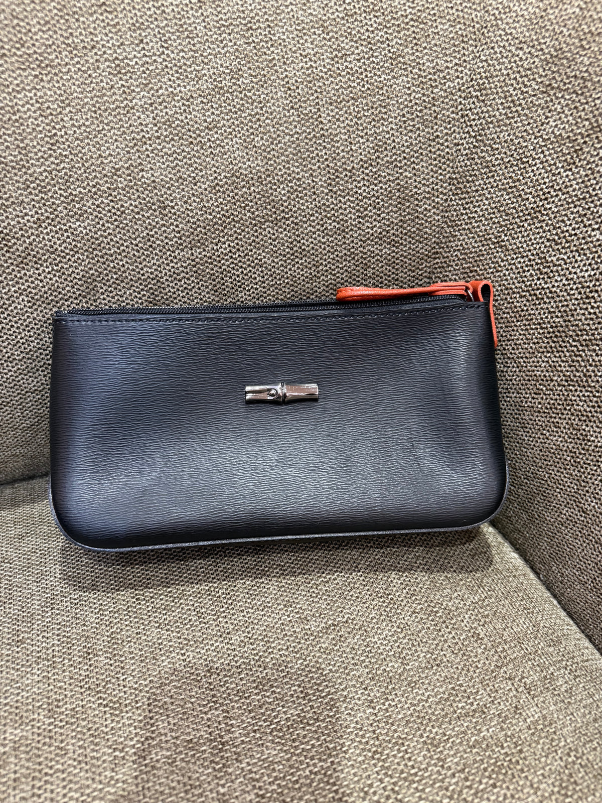 Pochette noir orange Longchamp cuir