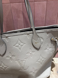 Sac Louis Vuitton emprinte neverfull beige