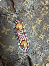 Sac Louis Vuitton en python et cuir d’autruche 15/08
