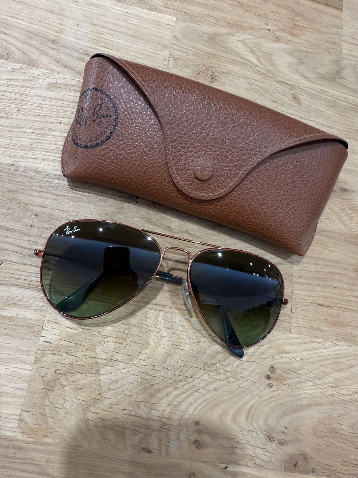 Lunettes de soleil Ray-Ban détail bronze TU