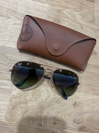 Lunettes de soleil Ray-Ban détail bronze TU