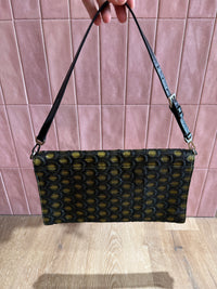 Pochette noire et dorée Prada 24/06