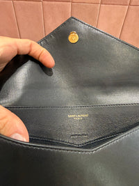Pochette en cuir saint Laurent 23/06