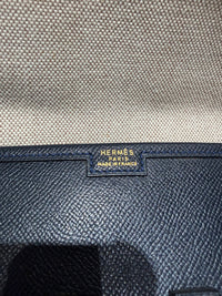Pochette en cuir bleu nuit juge Hermès - pochon fourni 29/10